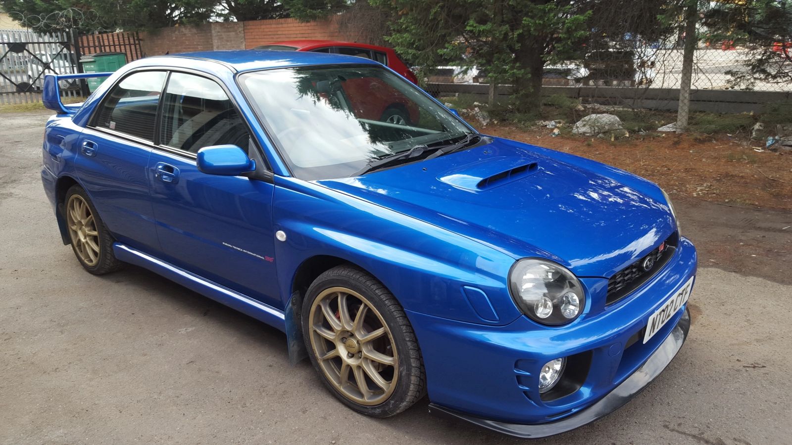 Refinished dark blue car