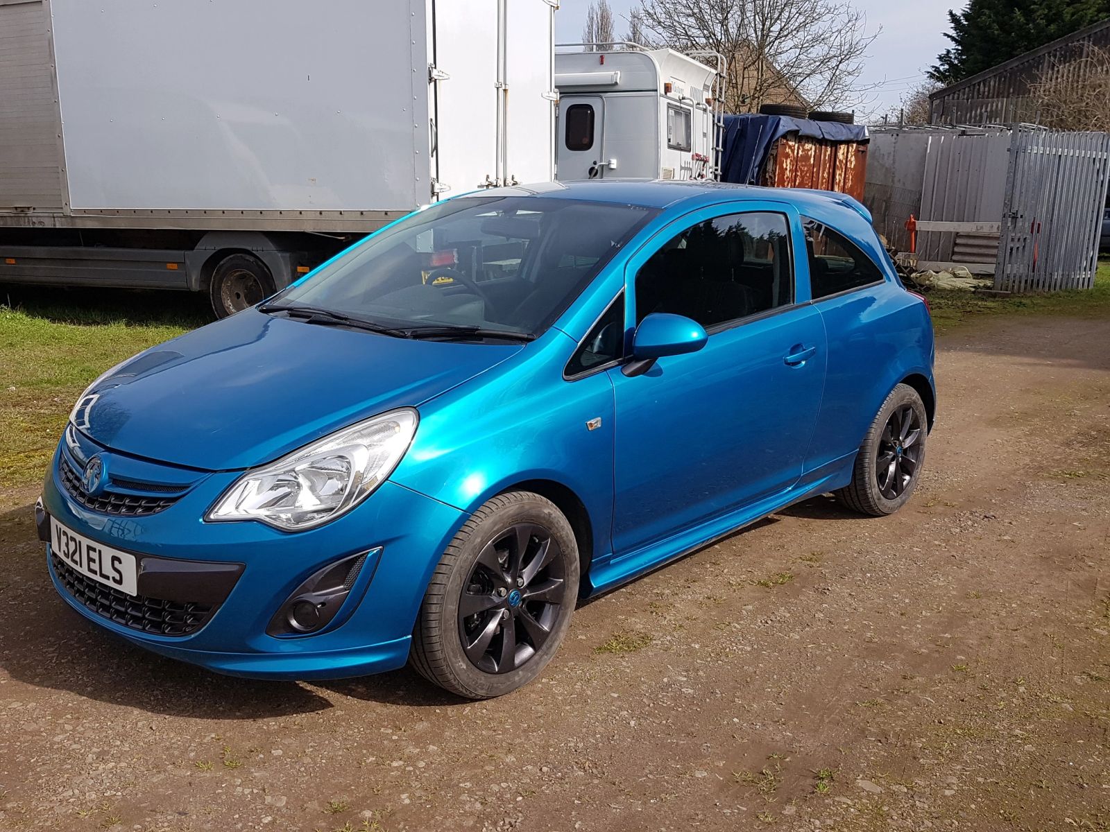 Resprayed blue hatchback